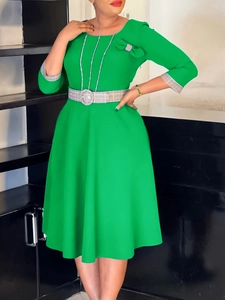 Elegant bright green A-line dress with plaid trim, round neck, and stylish chain detail