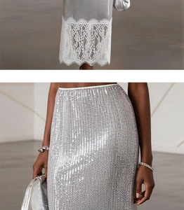 Detail of silver sequin mini skirt featuring delicate white floral lace patchwork hem