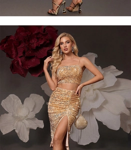 Detailed texture of champagne gold sequin crop top and high-waist side slit skirt set