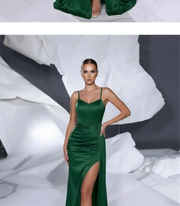 Detailed view of dark green satin evening gown featuring high slit and slim fit silhouette