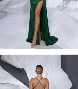 Detail of emerald green sequin dress with high slit and crisscross back straps