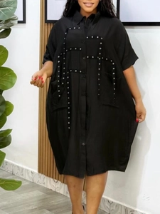 Women's black oversized cotton-linen shirt dress with silver eyelet rivet details