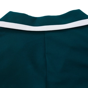 Detail of dark green dress neckline with a white horizontal stripe and stitched seam