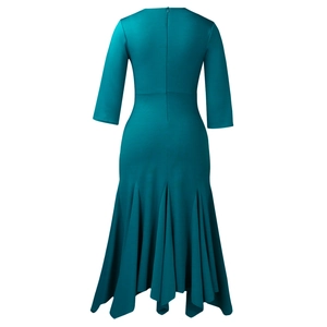 Back view of elegant dark green dress featuring a hidden zipper and mermaid ruffle hem