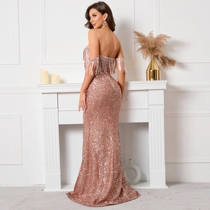 Elegant champagne sequin off-shoulder evening gown with fringe details and mermaid silhouette