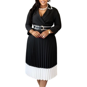 Close-up of elegant V-neck bodice with bicolor waist belt and golden buckle detail