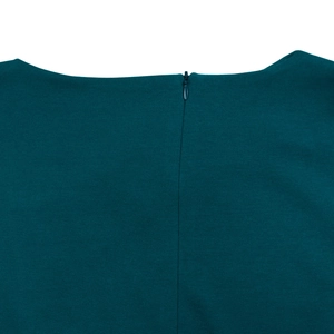 Close-up of invisible back zipper and fine texture on high-waist peacock blue dress