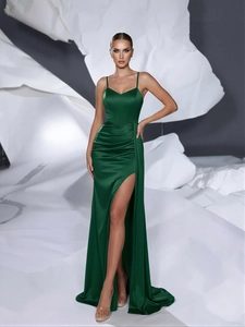 Elegant emerald green satin prom dress with spaghetti straps and high slit detail