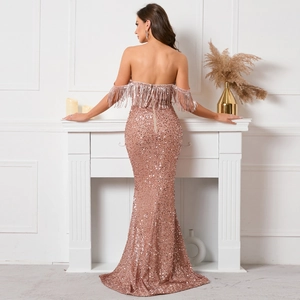Elegant rose gold sequin mermaid evening dress with off-shoulder fringe detail and slim fit