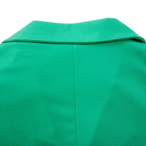 Detailed view of the bright green blazer dress collar and high-quality back stitching