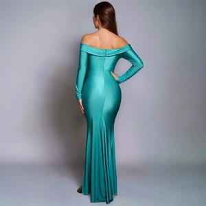 Detail of the elegant dark teal fishtail dress showing smooth fabric and back zipper