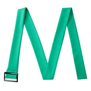 Detail of emerald green fabric belt with a black rectangular buckle in an M-shape layout