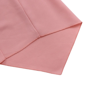 Detailed close-up showing the precise stitching and pink fabric texture of the dress