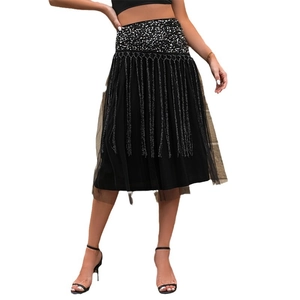 Elegant black high waist midi skirt with shimmering silver sequins and fine tassel fringe