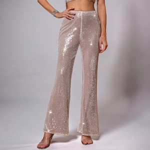 Elegant high-waisted champagne sequin flare pants for festive party events and celebrations