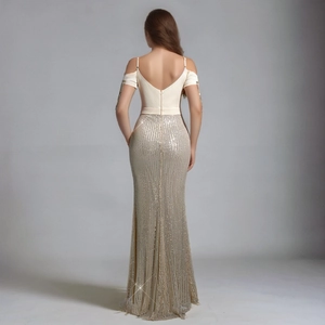 Elegant ivory and gold sequined backless evening gown with a flattering mermaid silhouette
