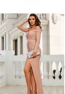 Detail view of pink champagne off-shoulder evening dress with ruched waist and side slit