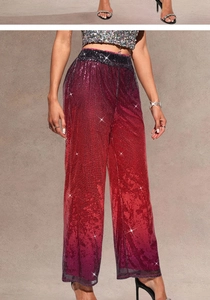 Detail of red and purple gradient sequins on high waisted wide leg party trousers