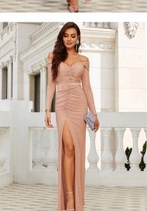Detail view of champagne rose gold sequins long sleeve V-neck evening gown with high slit