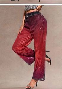 Detail of gradient red sequin wide leg pants with elastic high waist for party events