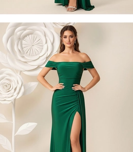 Detailed view of elegant green off-shoulder dress with high side slit and pleated waist