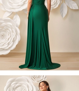 Detail of dark green evening gown showing elegant side pleats and silky fabric texture