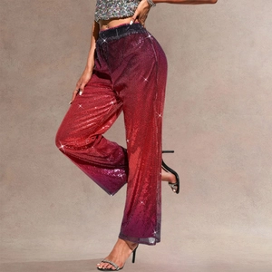 Sparkly high-waisted wide-leg trousers featuring a purple to red sequin gradient