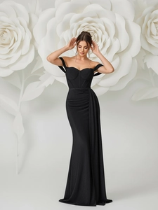 Elegant black off-the-shoulder evening gown with high slit and waist tie detail