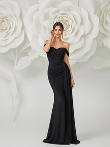 Elegant black off-shoulder evening gown with fisheye silhouette and side drape details