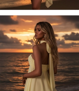 Détail de la robe en mousseline jaune avec col foulard au coucher du soleil