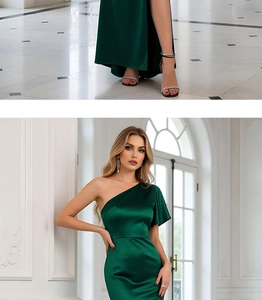 Detail of dark green satin evening dress featuring a high slit and ruffled one-shoulder design