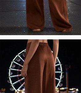 Détail du pantalon marron à jambes larges avec taille haute élastique et fini satiné chic
