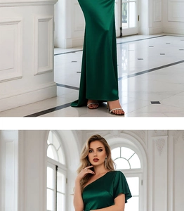 Detail of elegant dark green satin evening gown featuring a side slit and sleek finish