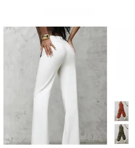 Detail of high-waisted flared trousers with elegant drape and slim fit tailoring