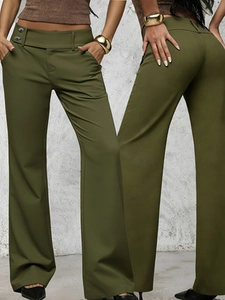 Detail view of olive green high-waisted wide-leg trousers with double metal buttons