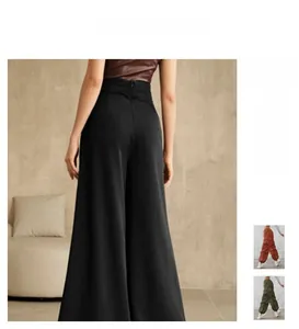 Close-up of high-waisted wide-leg trousers showing back detail and cargo utility pockets