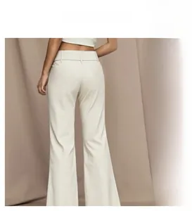 Detail view of high-waist beige flared pants back fit and cargo pocket options