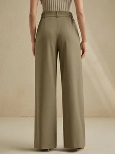 Women's high waist wide leg trousers in olive green showing a smooth back fit