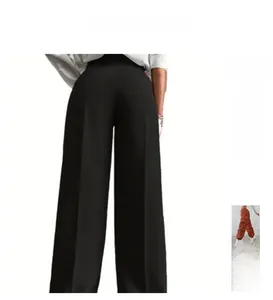 Detail view of high-waist black wide-leg trousers with vertical drape and front crease design