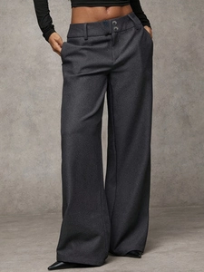 Women's dark gray low-rise wide-leg trousers with double-button closure and drapey fabric