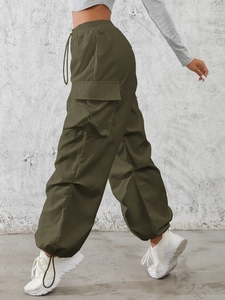 Women's olive green cargo pants with drawstring waist and multi-pocket street fashion style