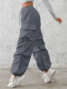 Women's dark gray cargo pants with elastic high waist and adjustable drawstring cuffs