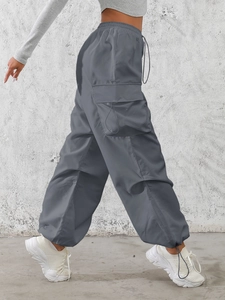 Women's high waist dark grey cargo pants with side drawstring pockets and adjustable hem