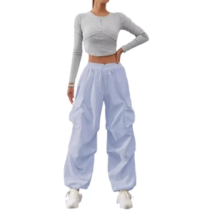 Detail of high waist cargo pants with side pockets and grey long sleeve ribbed crop top