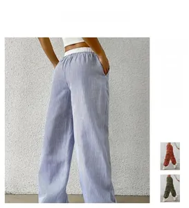 Vue détaillée arrière du pantalon rayé femme à taille haute avec ceinture élastique