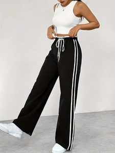 Pantalon de sport noir à taille haute pour femme avec rayures blanches et cordon de serrage