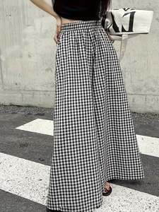 Pantalon large à carreaux noir et blanc pour femmes avec taille haute élastiquée