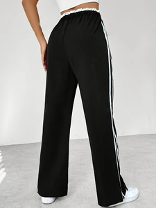 Pantalon large noir pour femme avec trois bandes latérales et taille élastique