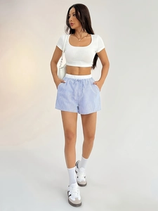 Women's summer two-piece set with white crop top and blue striped wide-leg shorts