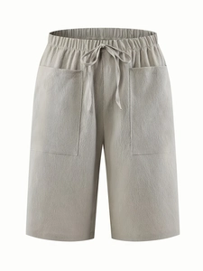 Women's light grey cotton linen shorts with elastic drawstring waist and large pockets